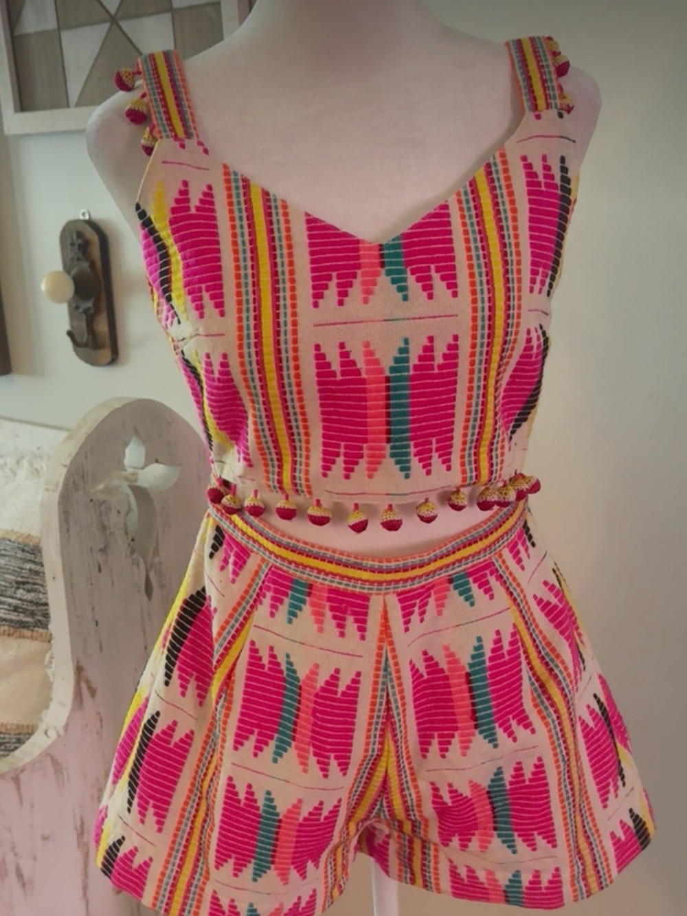 Saylor romper S , vibrant vivid colors, well made!! So many compliments!!